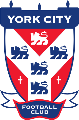 Official crest of York City Football Club featuring a red, white, and blue shield with lions.