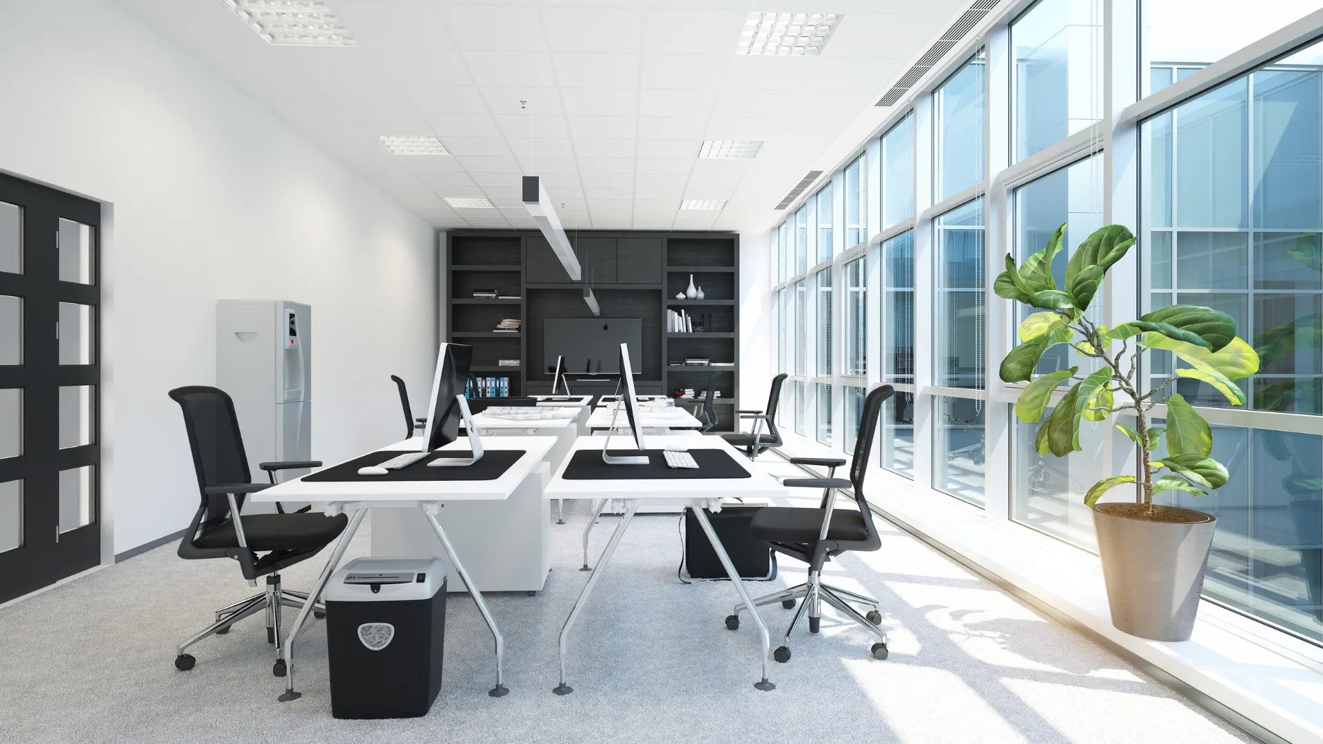 Modern York office interior with white desks, black chairs, floor-to-ceiling windows and a potted plant — Glo Clean cleaning