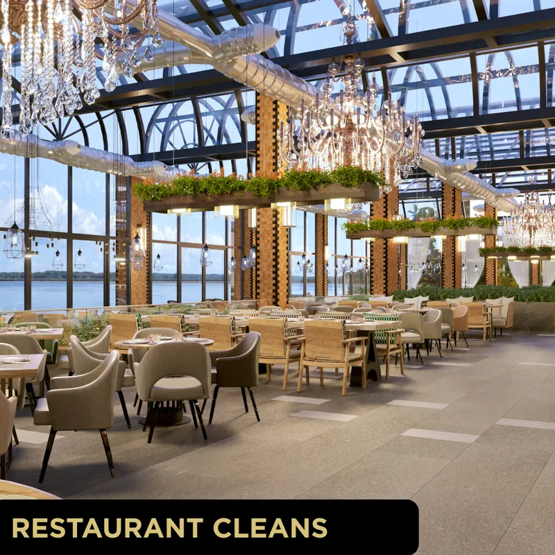 Glo Clean restaurant cleaning service: polished dining area with chandeliers, plants and large waterfront windows in York